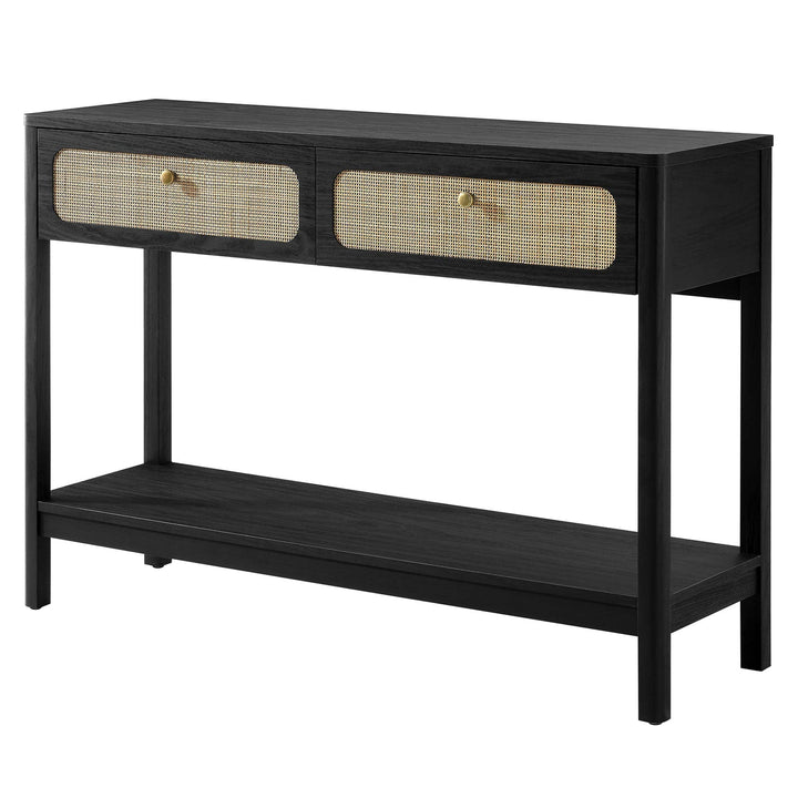 Black console table with woven drawer fronts on a white background