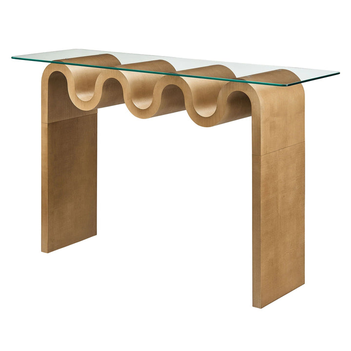 Modern console table with wavy design and glass top on a white background