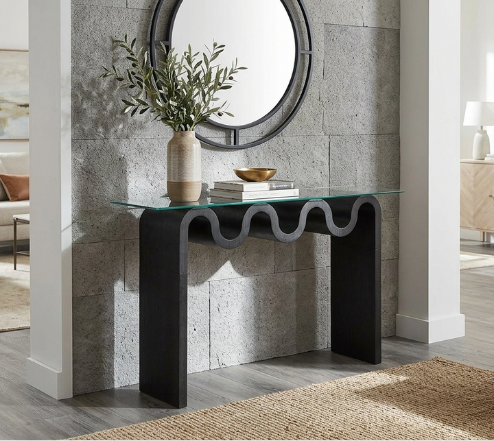 Modern console table with decorative items in a stylish living room.