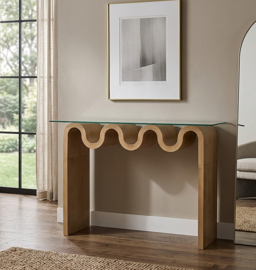 Wooden console table with glass top in a living room setting